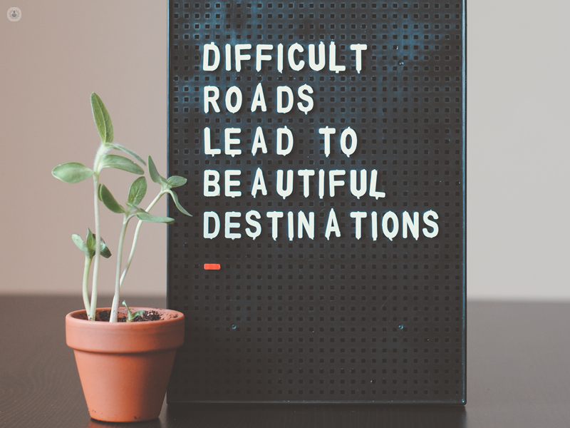 immagine di una pianta con una scritta "difficult roads lead to beautiful destination" per rappresentare il lavoro terapeutico